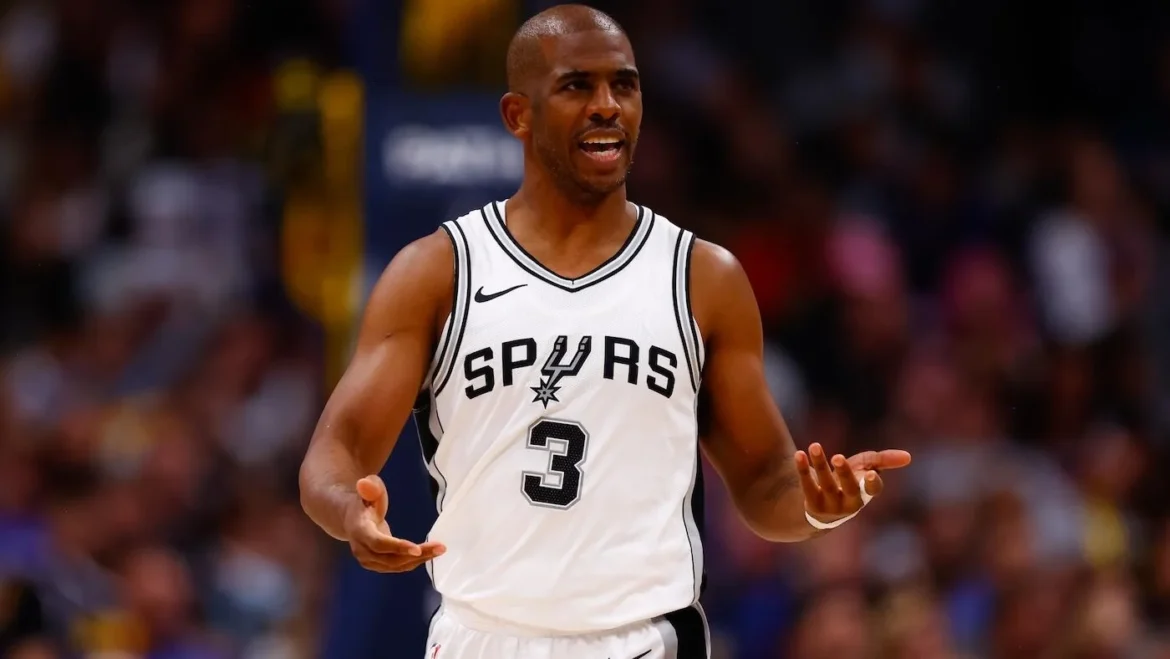 Chris Paul in San Antonio Spurs white jersey number 3 gesturing during game amid potential retirement discussions