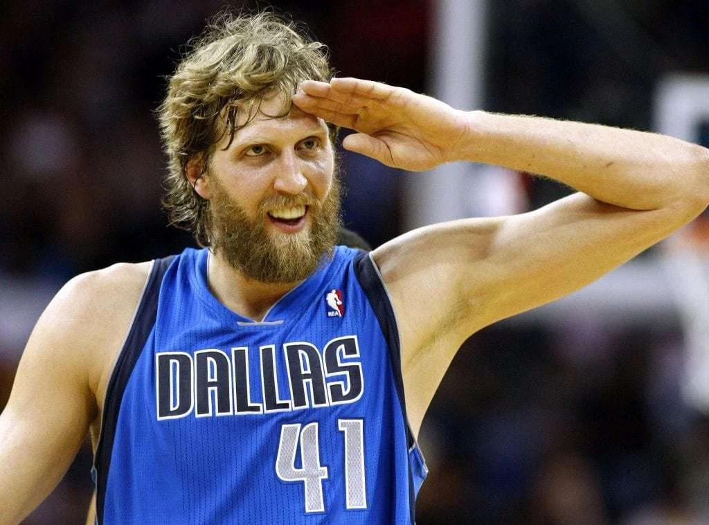 Dirk Nowitzki retirement legacy - Dallas Mavericks legend #41 during game action showing his signature style, representing the 21-season career blueprint that offers strategic retirement planning lessons