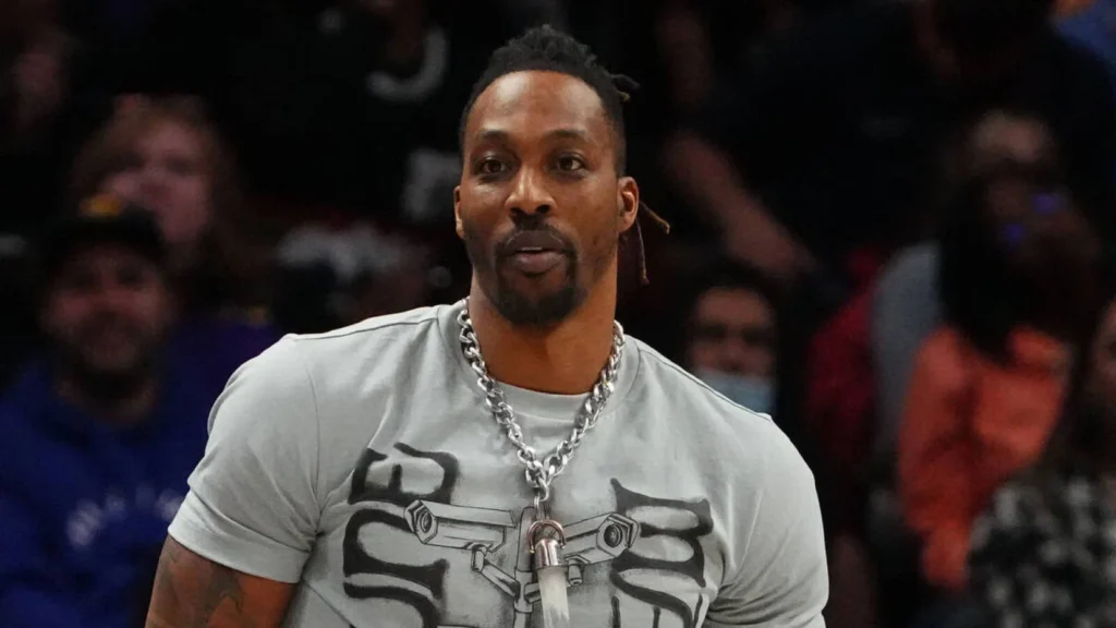 Dwight Howard retirement expectations - NBA veteran in casual attire at basketball arena, representing his post-career transition phase and $120 million net worth from 18-year basketball journey