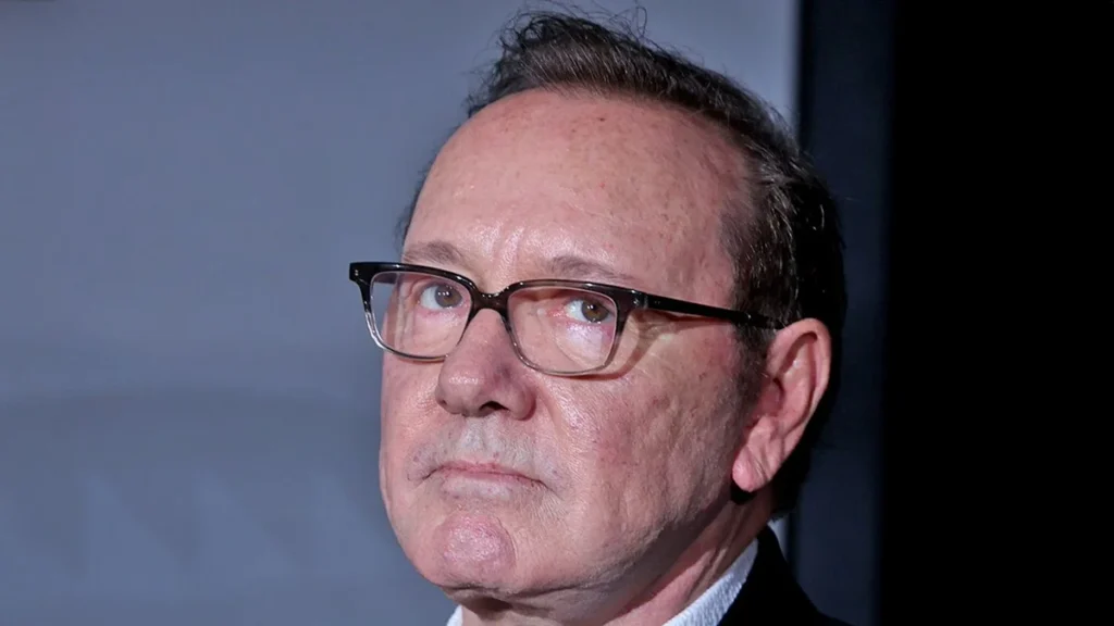 Kevin Spacey homeless situation - actor wearing glasses at public event amid financial crisis