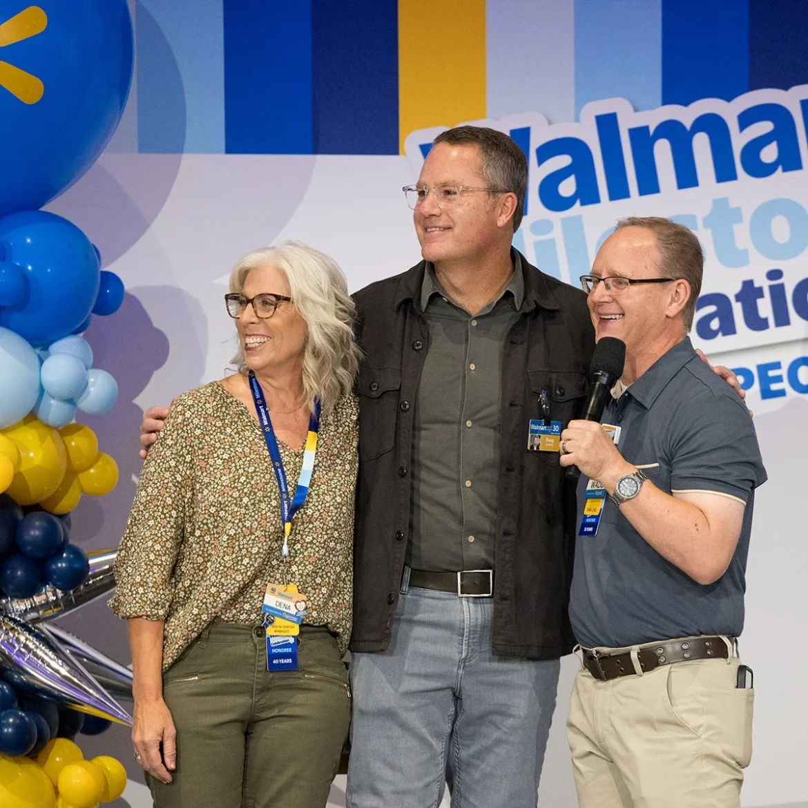 Walmart CEO Doug McMillon retirement announcement at company event with colleagues celebrating his leadership tenure